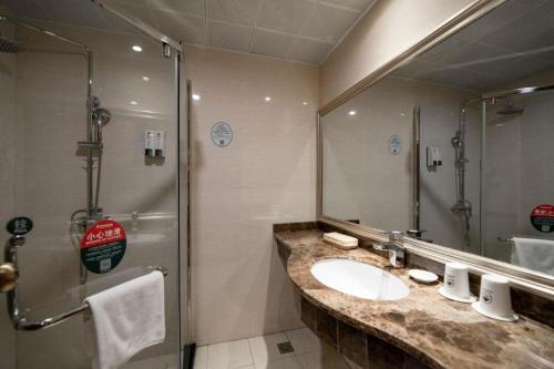 Un baño de GreenTree Inn ChiZhou QinGYAng Miaoqian Road Rongxing Building Business Hotel