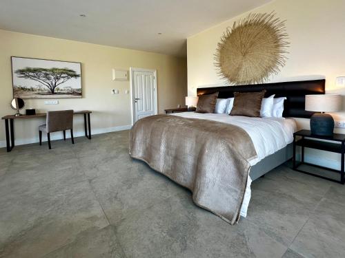 En eller flere senge i et værelse på Cape Vermeer