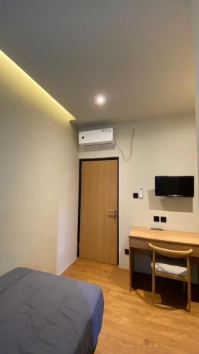 Postel nebo postele na pokoji v ubytování First Kost Seturan 32