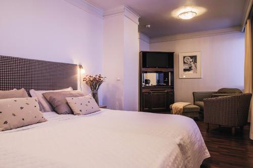 Llit o llits en una habitació de Hotel Seurahuone