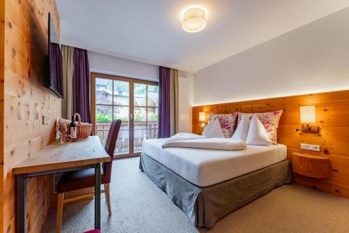 Voodi või voodid majutusasutuse Hotel Stadt Wien toas