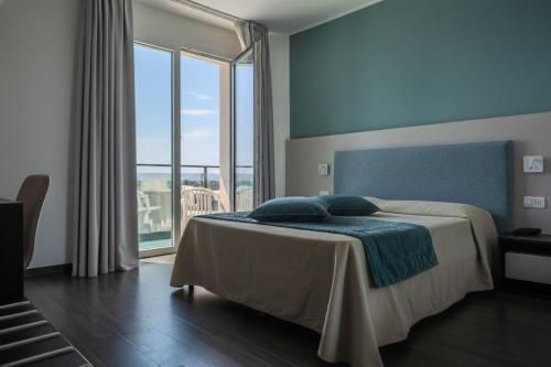 Кровать или кровати в номере Hotel Europa