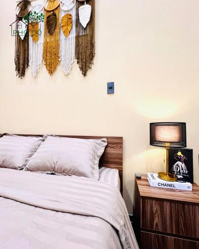 En eller flere senge i et værelse på Phố Cổ Homestay Hai Phong