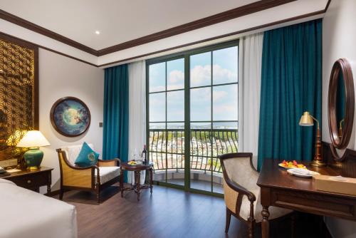 Ένα ή περισσότερα κρεβάτια σε δωμάτιο στο Best Western Premier Imperial Dalat