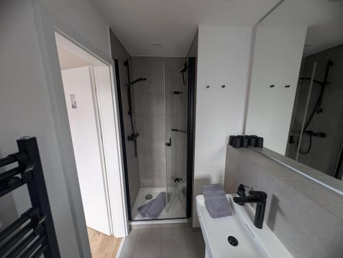 Phòng tắm tại Dünen Lodge 6