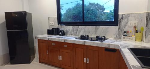 Køkken eller tekøkken på Khrisna Mooi villa 2 BR