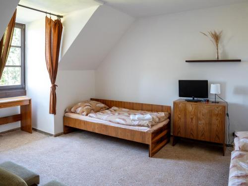 Rúm í herbergi á Holenský dvůr