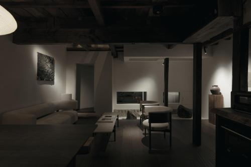 a living room with a couch and a table at Haku-ma 白間 in Kanazawa