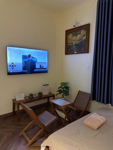 TV/trung tâm giải trí tại Looking homestay