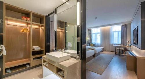 O baie la Echarm Hotel Jinan Railway Station Daming Lake