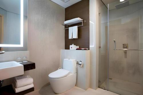 Koupelna v ubytování Hotel Grandhika Pemuda