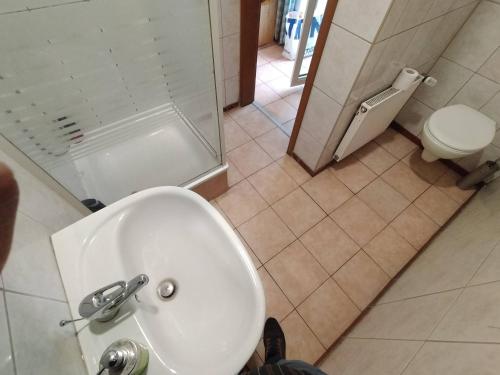 Koupelna v ubytování Apartment Haus