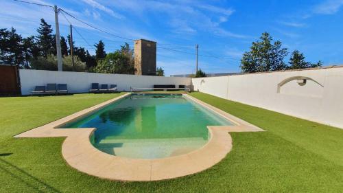 Bazén v ubytování Les Oliviers Family Villa CLIM WIFI PISCINE PARKING - ROSSIconciergerie - Linge inclus nebo v jeho okolí