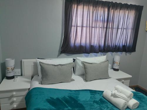 En eller flere senge i et værelse på WegkruiperQ 2