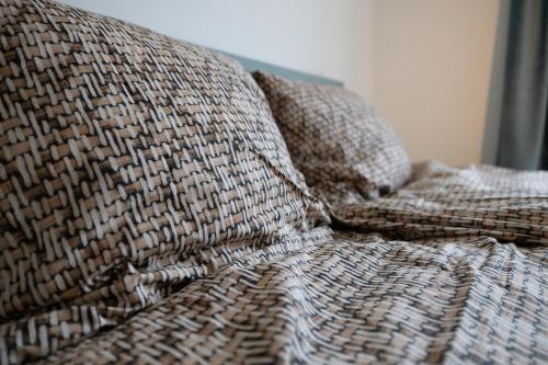 Giường trong phòng chung tại Raiffeisenstraat Eindhoven