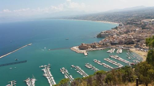 an aerial view of a marina with boats in the water at Colomba Bianca in Marsala