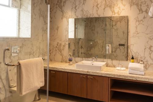 Koupelna v ubytování Park Suites