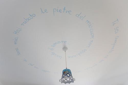 a heart shaped necklace with a pendant at Hotel Amarea - Aeolian Charme in Canneto