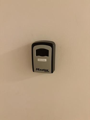 a black and white appliance on a wall at Les Glaneuses gîte Entre Amis centre-bourg à 3 min du Puy duFou in Les Épesses