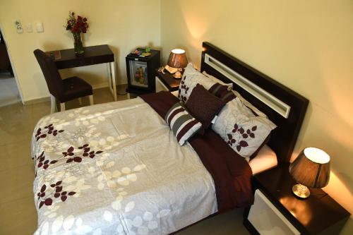 Ένα ή περισσότερα κρεβάτια σε δωμάτιο στο Hostal San Francisco de Asis