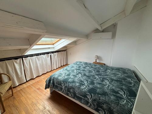 Llit o llits en una habitació de Logement indépendant