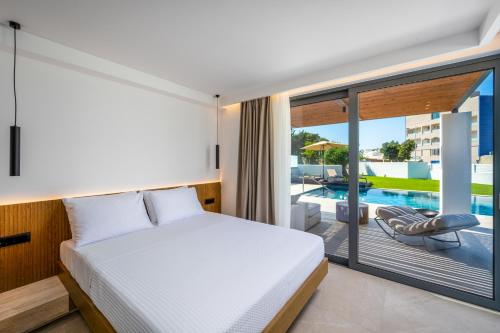 Postel nebo postele na pokoji v ubytování Alma Luxury Villas