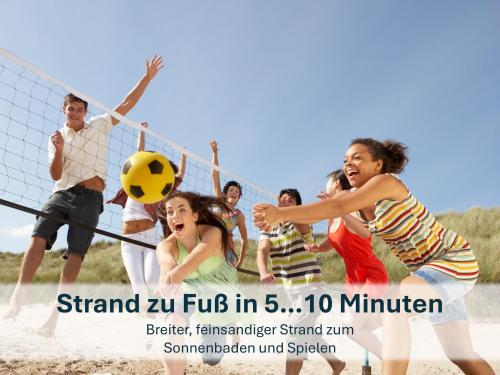 a group of people playing volley ball on the beach at Heringsdorf, Ferienwohnung Hanni in Heringsdorf
