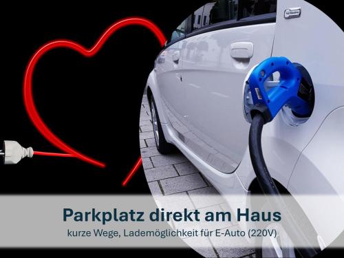 a car is hooked up to a car charger at Heringsdorf, Ferienwohnung Hanni in Heringsdorf
