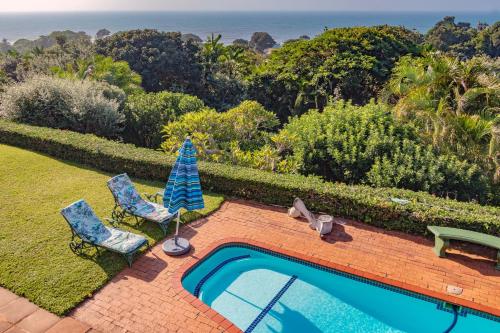 Swimmingpoolen hos eller tæt på Golf House