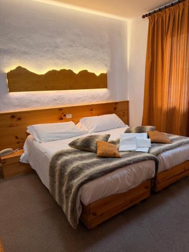 Ένα ή περισσότερα κρεβάτια σε δωμάτιο στο Hotel Splendid