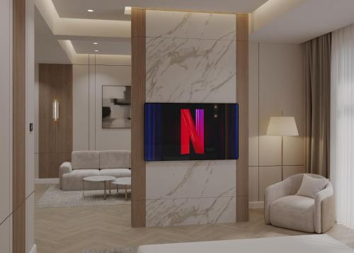 Et tv og/eller underholdning på Emir's Garden Boutique Hotel