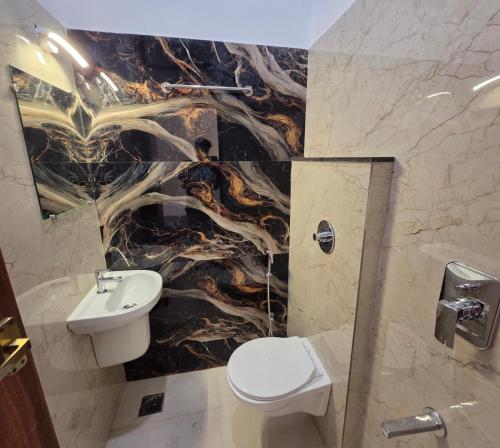 Koupelna v ubytování Hotel Ponrayar