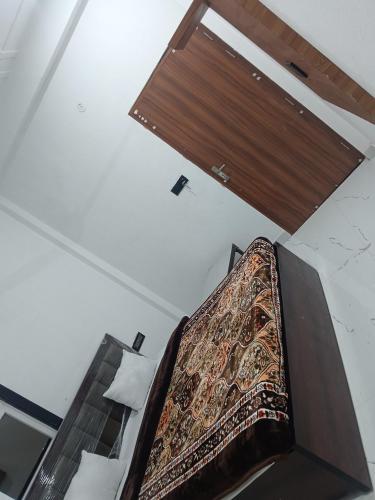 Postel nebo postele na pokoji v ubytování HOTEL TOWN INn