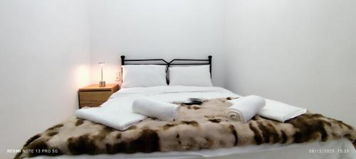 Postel nebo postele na pokoji v ubytování Αγιονέρι