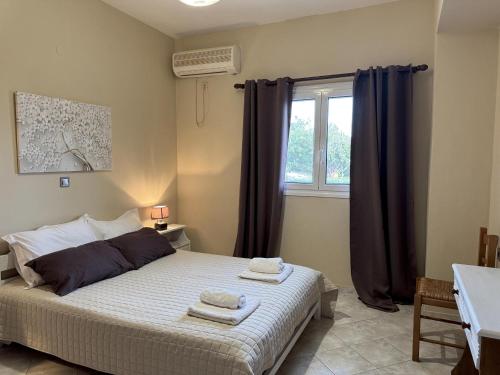 Postel nebo postele na pokoji v ubytování Georgia