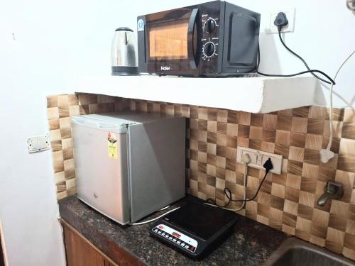 Kuchyň nebo kuchyňský kout v ubytování Blueberry Heritage Residency