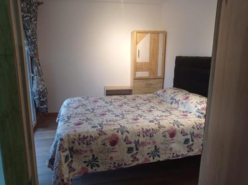 Giường trong phòng chung tại El Refugio del Chucao