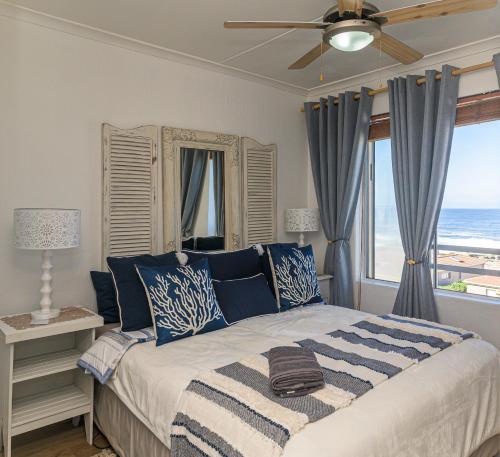 En eller flere senge i et værelse på Tide and Whale Tail