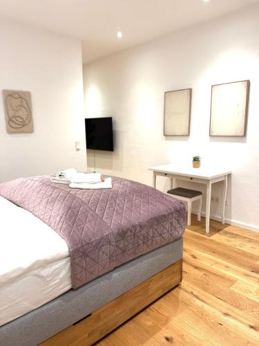 En eller flere senge i et værelse på NIRO I Exklusive Residenz - Historischer Ballsaal