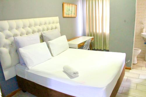 Postel nebo postele na pokoji v ubytování Zabalaza Guesthouse