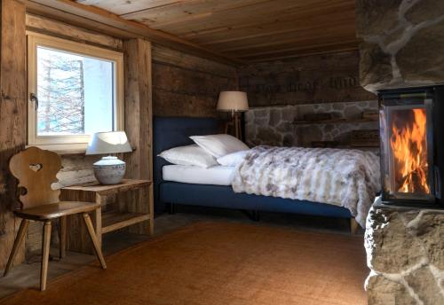 Ένα ή περισσότερα κρεβάτια σε δωμάτιο στο Chalet with fireplace and sauna