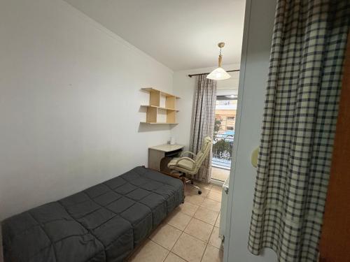 En eller flere senge i et værelse på KTELI Sleep & Chill Apartment