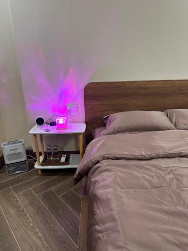 En eller flere senge i et værelse på Yên Homestay & cafe