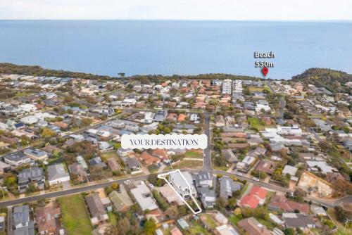 a view of a city with a street sign at Poolside Luxury Villa - Solar Pool Beach 3min in Mornington