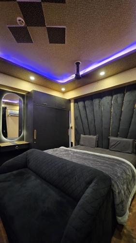 Giường trong phòng chung tại The24Stay