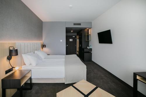 Postel nebo postele na pokoji v ubytování B&B HOTEL Warsaw East