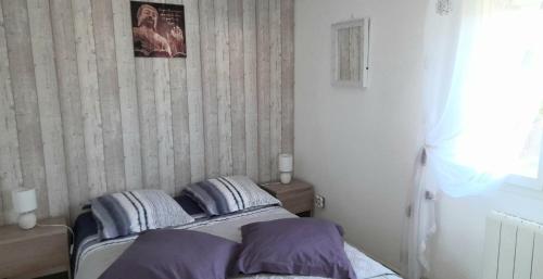 Ένα ή περισσότερα κρεβάτια σε δωμάτιο στο Chambres D'hôtes Le Paradis