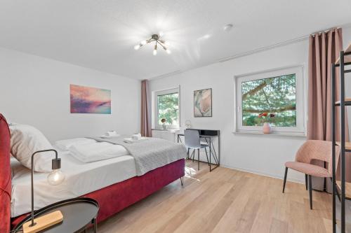 Postel nebo postele na pokoji v ubytování CityFlair 6 Pers Flughafen Stuttgart Messe U7 Whg2