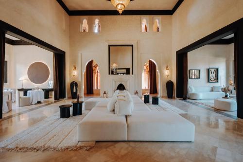 En eller flere senge i et værelse på Villa Sumaïa - Maison de caractère, Boutique Hotel