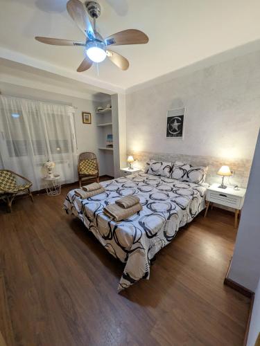 En eller flere senge i et værelse på Estrella azul/ Blue star